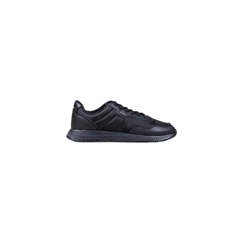 Black leather reebok sneaker with textured sole and lace-up design.