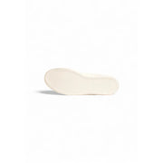 Cream-colored rubber sole with textured grid pattern on boss white leather sneakers for men fall winter collection