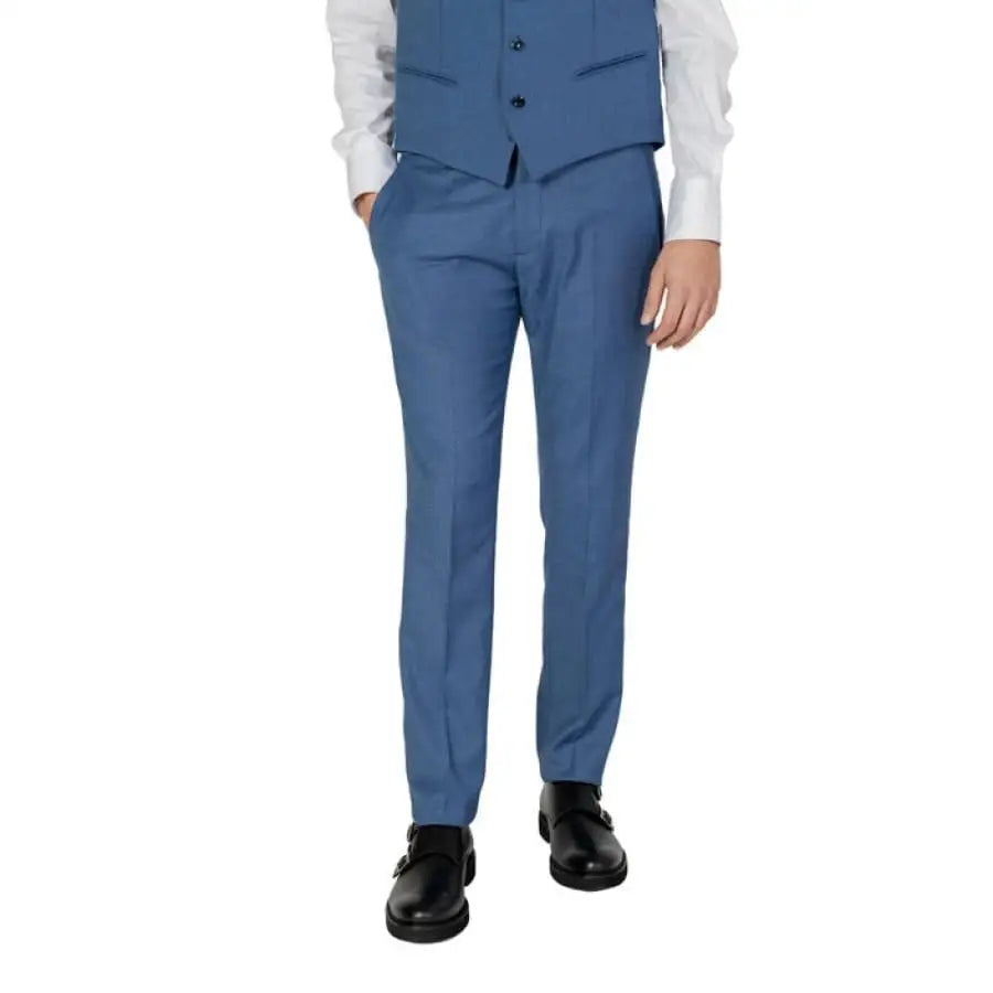 Boy in Antony Morato blue suit and tie for Men Trousers product display.