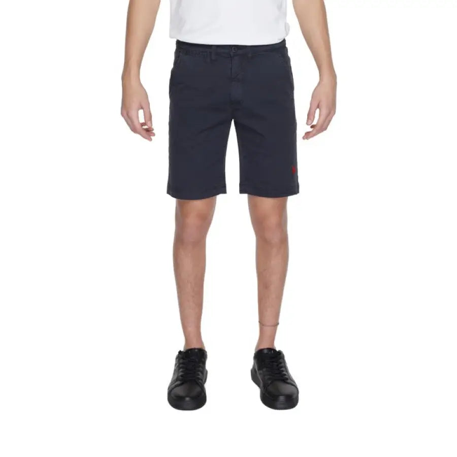 Boy in U.S. Polo Assn. shorts embodying urban city fashion