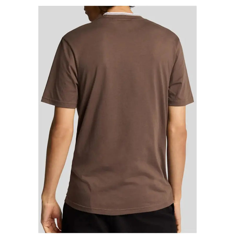 Brown short sleeve t shirt with white striped collar featuring a subtle white trim along the neckline