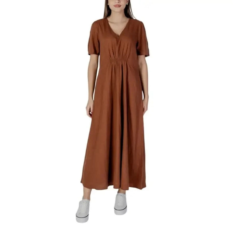 Brown V-neck maxi dress showcased in Black V-Neck Short Dress by B.young
