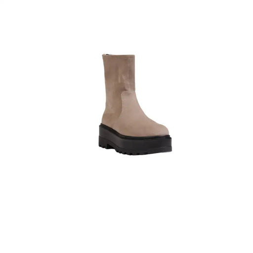 Calvin Klein beige suede ankle boots with zip closure and thick black platform sole