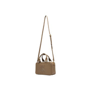 Calvin Klein beige leather crossbody bag with structured rectangular shape and gold-tone ck logo on front with zipper closure