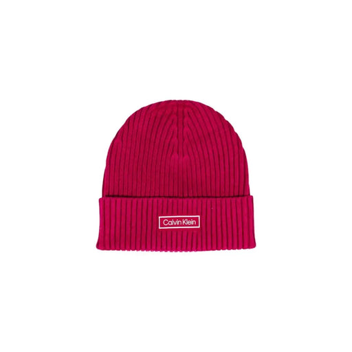 Pink calvin klein beanie with white logo.
