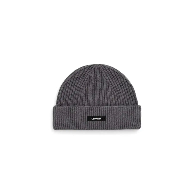 Gray calvin klein ribbed beanie with logo label.