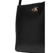 Calvin Klein black leather tote bag with shoulder strap featuring a gold-tone ck logo emblem