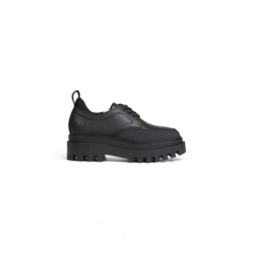 Calvin Klein black leather lace up women’s shoe with chunky textured rubber sole for durable comfort