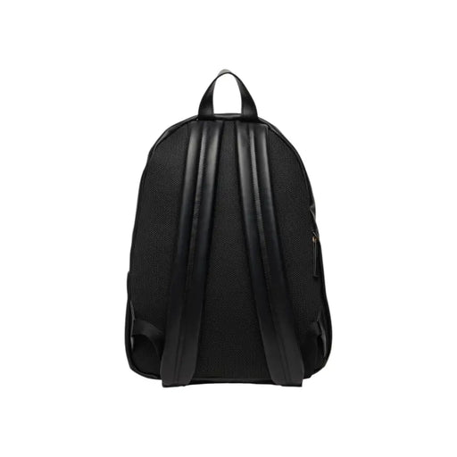 Calvin Klein black rucksack with smooth leather straps mesh back panel and zip pockets shown from the back side