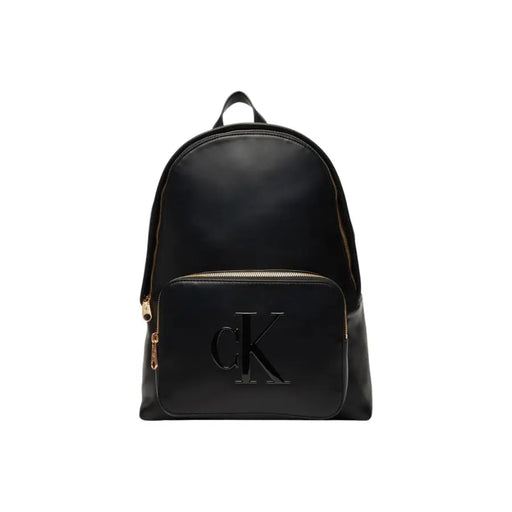 Calvin Klein black rucksack with gold-tone zipper pockets and prominent ck logo on front pocket