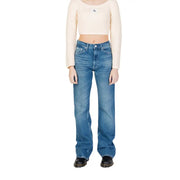 Calvin Klein blue women’s denim jeans with classic five-pocket design and faded worn-out effect in cotton material
