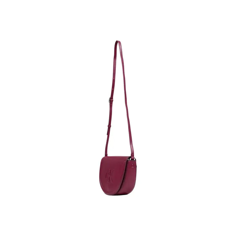 A sleek burgundy leather Calvin Klein crossbody bag with minimalist ck logo for women