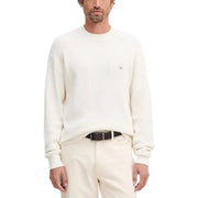 White textured crew neck sweater with logo detail on left chest.