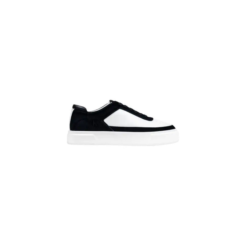 Calvin Klein Jeans black leather sneakers for men with a black and white platform design featuring suede and smooth leather panels
