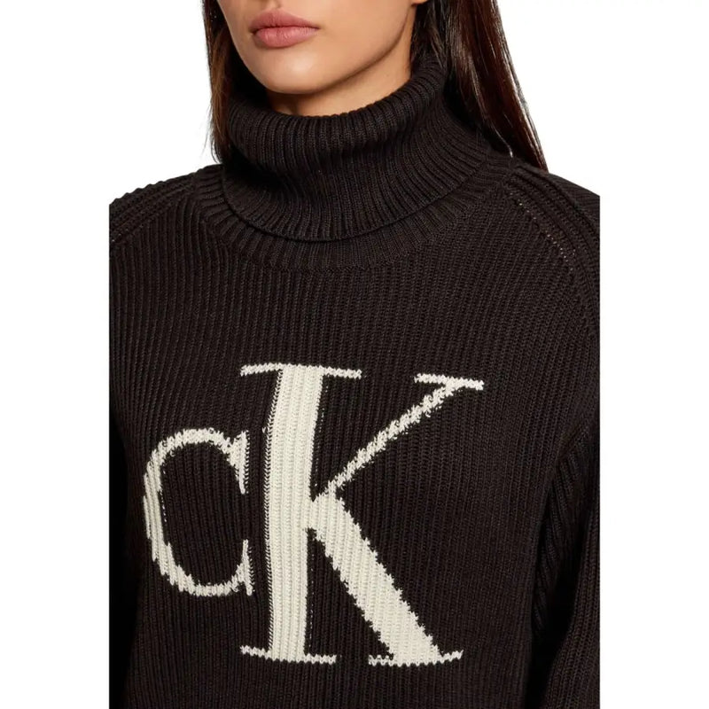 Calvin Klein Jeans black ribbed turtleneck knitwear for women with large off-white ck logo on front