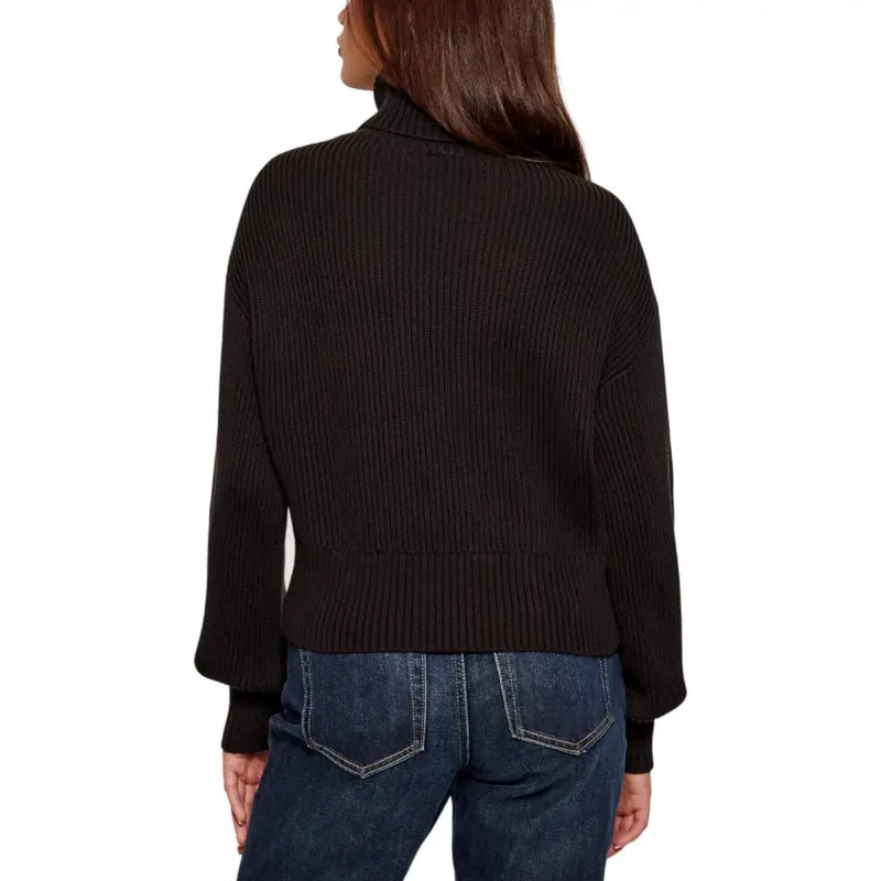 Black ribbed knit turtleneck sweater with long sleeves and cropped hem from Calvin Klein Jeans women’s knitwear