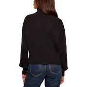 Woman wearing Calvin Klein Jeans black ribbed knit turtleneck sweater for women