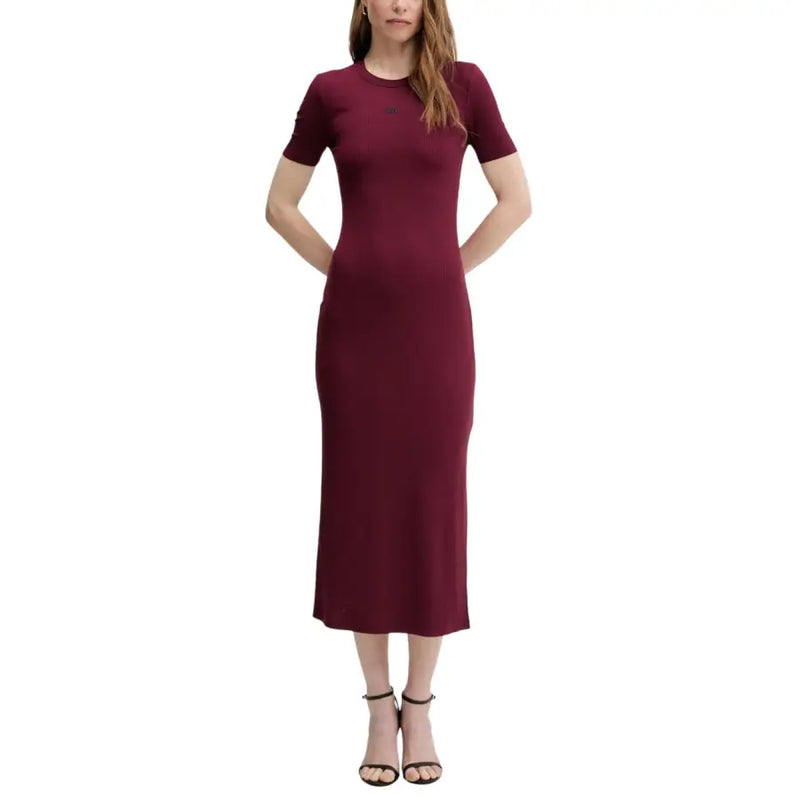 A sleek maroon Calvin Klein Jeans bordeaux modal dress for women with short sleeves and a round neckline