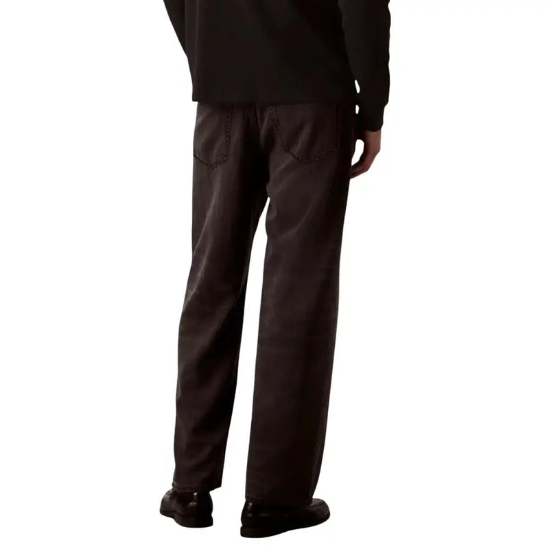 Calvin Klein Baggy-Jeans für Herren, schwarze Lyocell-Viskose, Rückseite sichtbar, mit dunkelgrauem, weitem Bein und entspannter Passform.