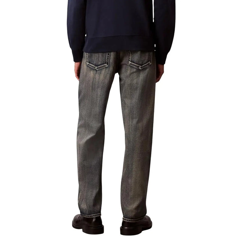 Back side view of calvin klein jeans men beige cotton blend zip dark gray denim jeans with white stitched pockets