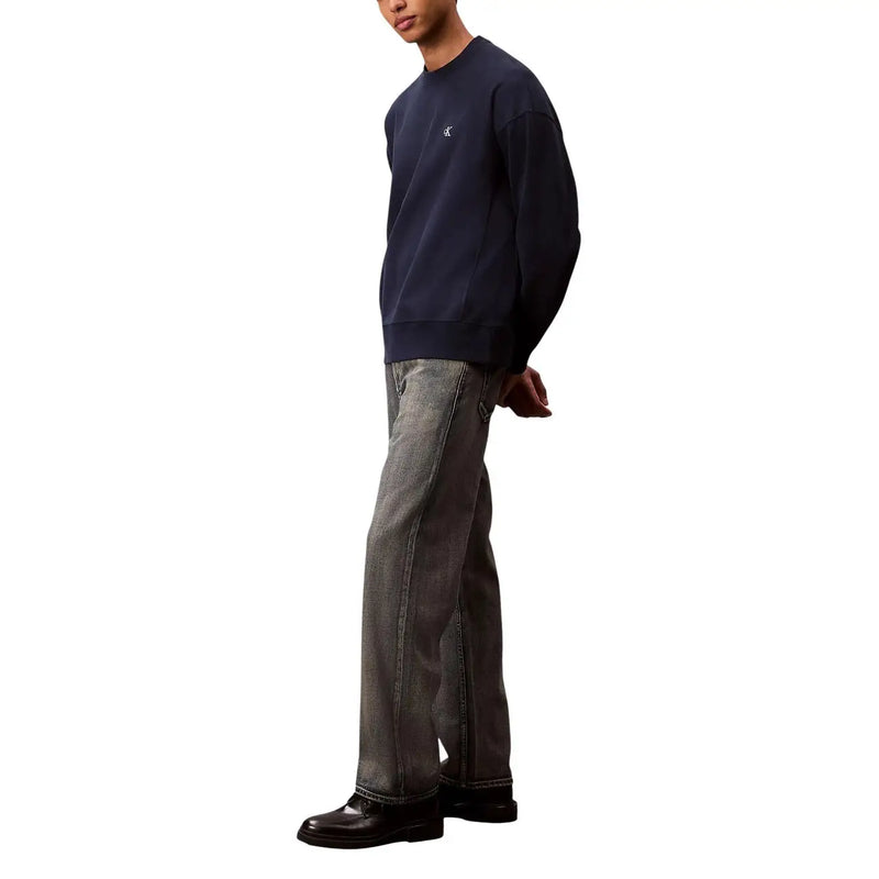 Navy blue crewneck sweatshirt with small white logo on left chest in calvin klein jeans men beige cotton blend zip jeans set