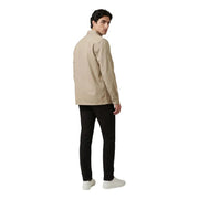 Beige cotton jacket with classic collar and buttoned cuffs by Calvin Klein Jeans for men in a shirt style