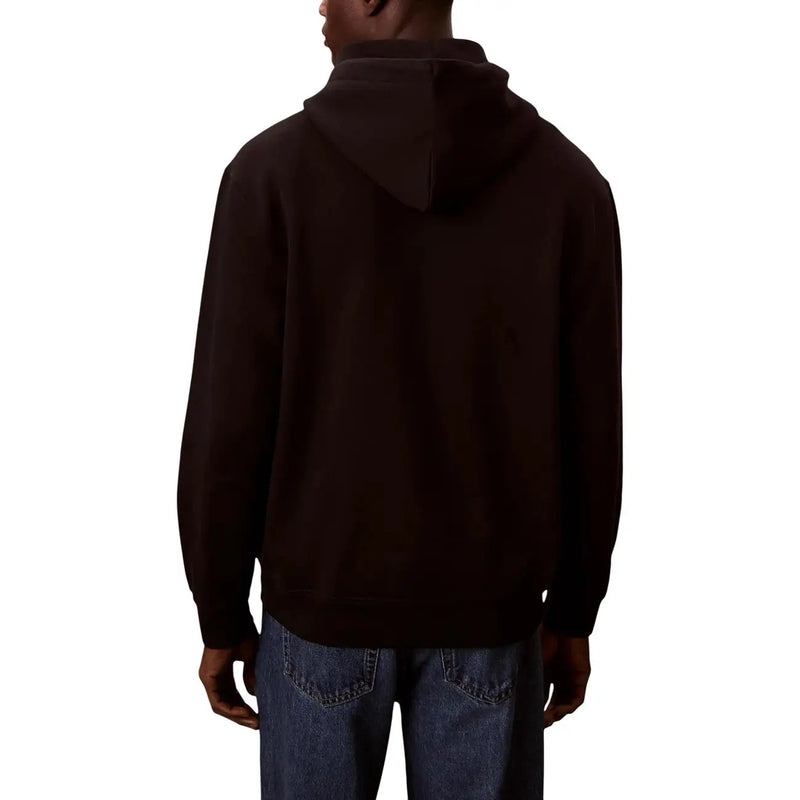 Calvin Klein Jeans men black cotton round neck sweatshirt featuring a dark brown long-sleeved hoodie with ribbed cuffs