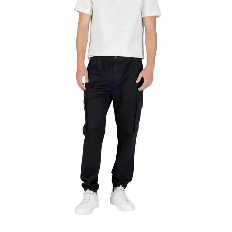 Men’s black cargo pants with elasticated cuffs from Calvin Klein Jeans for fall winter wear