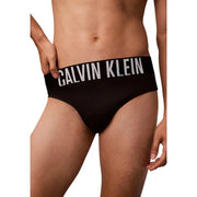 Schwarze Calvin Klein Jeans Herren-Badehose aus Polypropylen mit auffälligem weißen Logoband am Bund