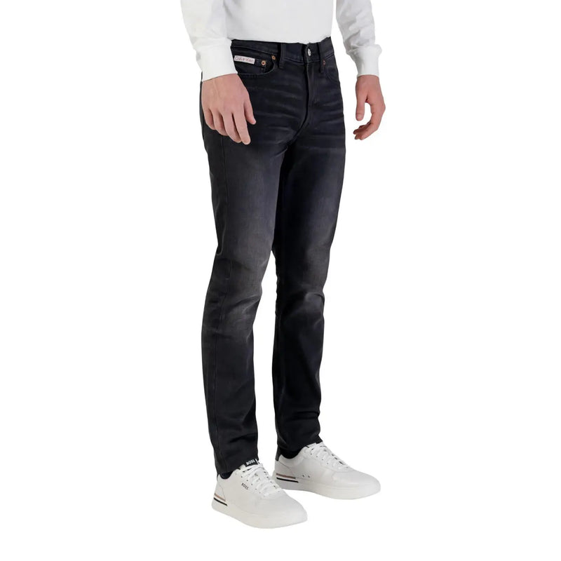 Calvin Klein Jeans men black slim fit cotton denim jeans with subtle fading and zip button closure