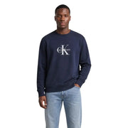 Marineblau Calvin Klein Jeans Herren-Baumwoll-Sweatshirt mit Rundhalsausschnitt und weißem CK-Logo auf der Brust