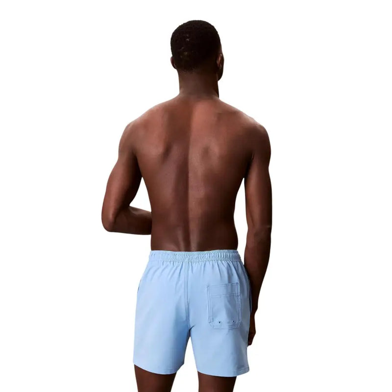 Calvin Klein Jeans Herren-Badehose aus Polyester, blau mit Kordelzug, hellblaue Badehose mit lockerer Passform und elastischem Bund