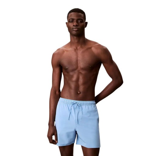 Light blue polyester Calvin Klein Jeans men swim trunks with drawstring waistband for comfortable wear