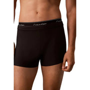 Calvin Klein Jeans Schwarze Herren-Badehose mit doppeltem Bund, bestehend aus schwarzen Boxershorts mit weißem Logoband