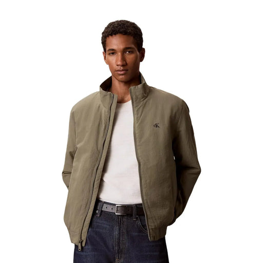 Olive green nylon bomber jacket with subtle Calvin Klein logo on left chest from Calvin Klein Jeans Men collection