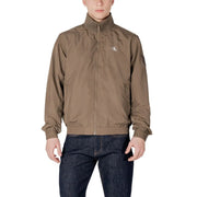 Calvin klein jeans men tan polyamide zip-up jacket with subtle chest logo and elastic cuffs