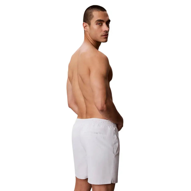 Calvin klein jeans men white athletic shorts with relaxed fit and elastic waistband for casual wear