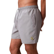 Calvin Klein Jeans graue Herren-Badeshorts aus Polyester, Größe M, mit dezentem goldenem Logo am Unterschenkel zum Schwimmen