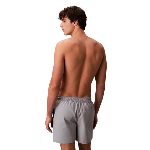 Calvin Klein Jeans men grey polyester swim shorts with elastic waistband and side pocket medium size
