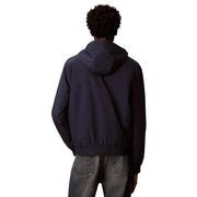 Calvin Klein Jeans Herrenblazer aus blauem Polyester mit Kapuze, elegantem, modernem Design und gerippten Bündchen (Vorderansicht)