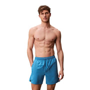 Calvin Klein Jeans Herren-Badeshorts aus hellblauem Polyester mit leuchtend blauem Kordelzugbund zum Schwimmen
