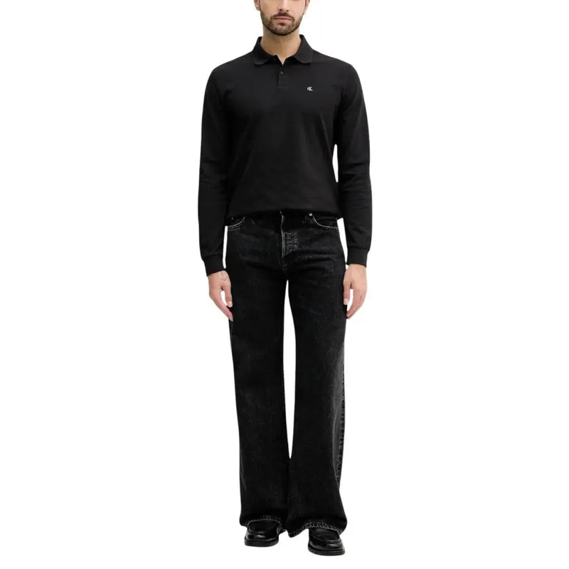 Calvin Klein Jeans Schwarzes Herren-Polohemd aus Baumwolle mit langen Ärmeln und kleinem, gesticktem Logo auf der Brust