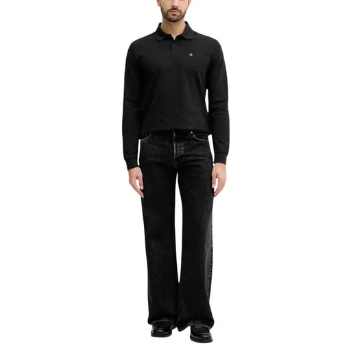Calvin Klein Jeans Schwarzes Herren-Polohemd aus Baumwolle mit langen Ärmeln und kleinem, gesticktem Logo auf der Brust