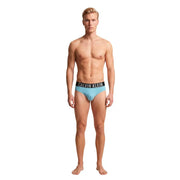 Light blue Calvin Klein Jeans men swimwear briefs with black waistband and white logo lettering