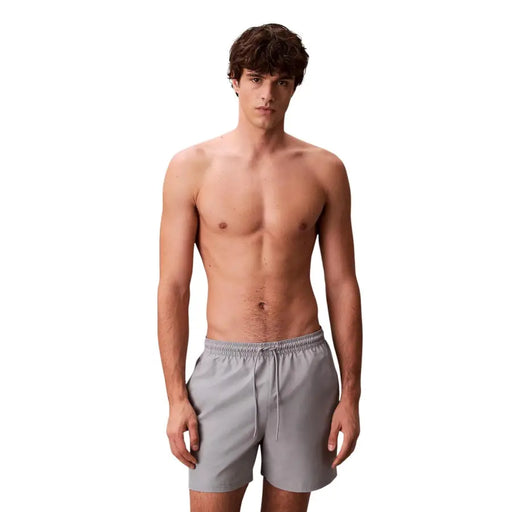 Calvin klein jeans men swimwear gray swim trunks with drawstring waistband for comfortable beachwear