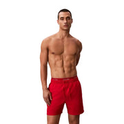 Calvin Klein Jeans men swimwear red swim trunks with drawstring waistband designed for comfortable beachwear
