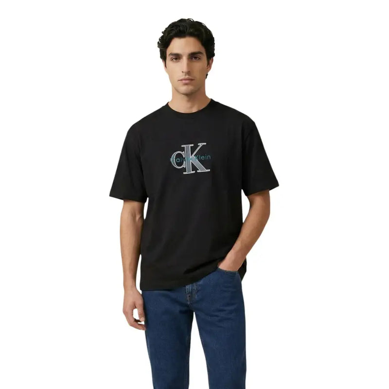 Schwarz Calvin Klein Jeans Männer t-shirt mit markantem, gesticktem CK-Logo in Türkis und silbernen Details