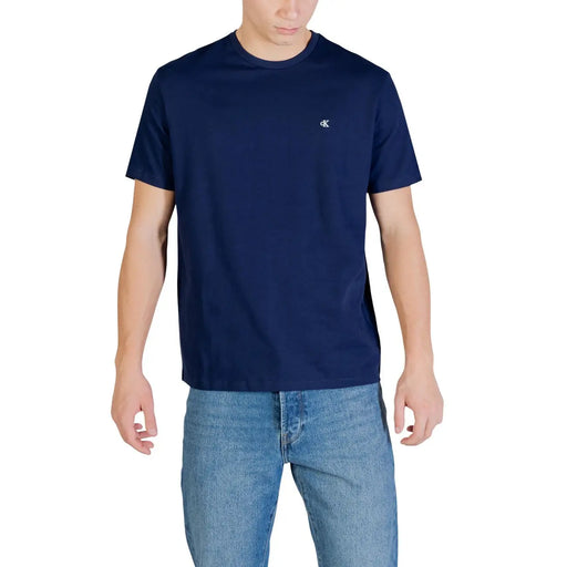 Navy blue Calvin Klein Jeans men t shirt with small white logo on left chest made of 100% cotton monogram fabric