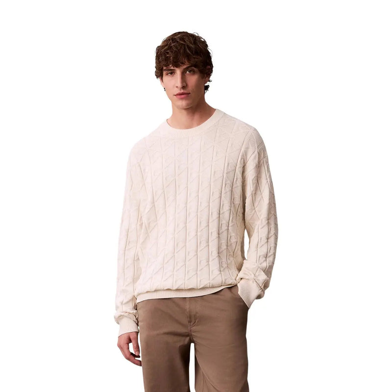 Calvin Klein Jeans men white geometric cotton knitwear featuring a cream-colored cable-knit sweater with ribbed cuffs