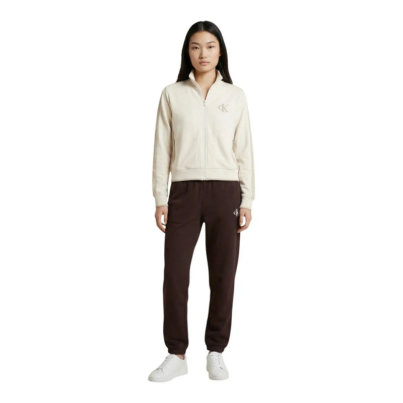Calvin Klein Jeans women beige cotton blend zip-up track jacket with embroidered logo and matching dark brown joggers